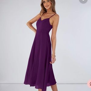 Purple midi cocktail dress with slit. Perfect for wedding guest or bridesmaid.